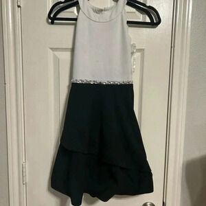 Xtradionary youth size 12 semi formal black and hire dress